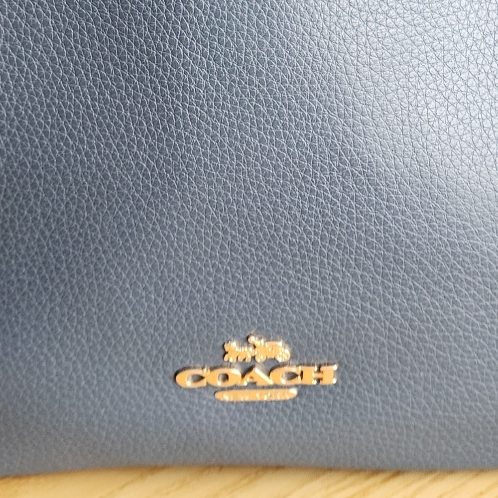 Coach Navy Leather Handbag with Gold Accents